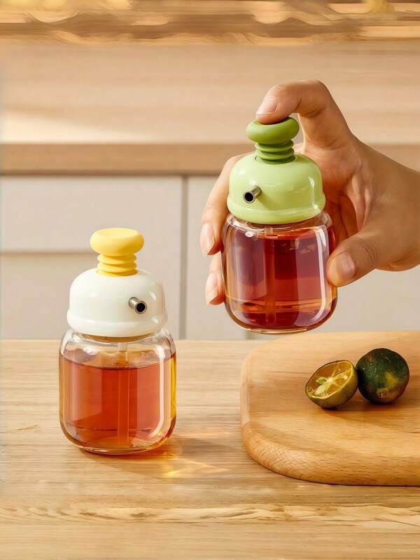 Glass Oil Bottle With Pressure Controlled Precise Dispensing And Oil Regulation Function, Modern Design, Suitable For Soy Sauce, Vinegar And Condiments. Reusable Kitchen Oil Bottle With Precise Pressure Controlled Dispensing Technology, Available In Green And White Colors. Kitchen Glass Oil And Vinegar Bottle.