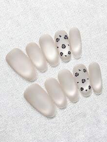 10pcs Handmade Oval-Shaped Nail Stickers, Soft Cream White Matte Finish, With Hand-Painted Light Brown Leopard Print Pattern. Gentle And Elegant Nail Decals Suitable For Ladies And Girls To Use In Spring, Summer, Autumn And Winter Festivals, Parties And Daily Life. - White - View 2