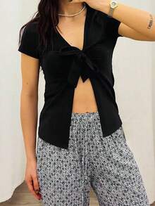 Stylish Women's Deep V Neck Knitted Short Sleeve Top With Tie Front Detail Regular Fit Slit Hem Semi-Sheer - Black - View 2