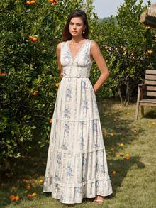 PARTHEA 这款别具一格的波西米亚风无袖深V领A字长裙，采用褶裥设计、露背剪裁、多层裙摆，并饰以对比鲜明的蕾丝和花卉印花，展现出优雅高贵的风格。 - 淺藍色 - 查看 1