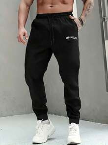 男士纯色简约针织运动裤，十字印花，适合运动和日常休闲穿着，时尚舒适。送给男友或老公的绝佳礼物。 - 黑色 - 查看 4