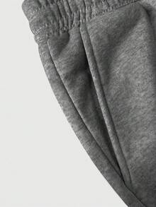 Quần nỉ nam cỡ lớn, dáng rộng, màu xám đậm, thiết kế dây rút, thoải mái và đa năng. - Màu xám đen - Xem 3