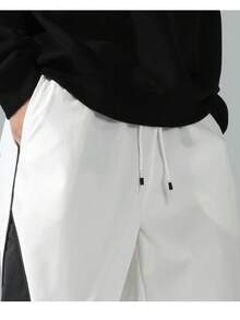 男士街头风运动裤 - 轻盈涤纶运动裤，侧边条纹，带口袋和抽绳腰带，撞色休闲运动裤，适合街头穿着、慢跑、户外休闲、健身房等场合，时尚百搭。 - 白色 - 查看 8