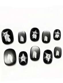 10pcs It's Called Starry Night Sparkle. This Manicure Features Sleek Black As The Base, Paired With Shimmering Silver Star Motifs (Dusted With Glitter) And Minimalist White Accents. The Mix Of Matte And Glossy Textures Adds Depth, Giving It A Chic, Nocturnal Charm-Ideal For Those Who Love Elegant, Celestial-Inspired Nail Designs. - Black - View 1