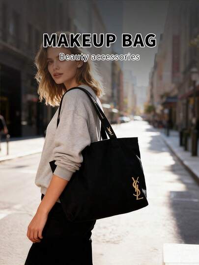 Yves Saint Laurent 黑色帆布单肩包，极简高端风格，大容量，适合工作、购物、上学和旅行。