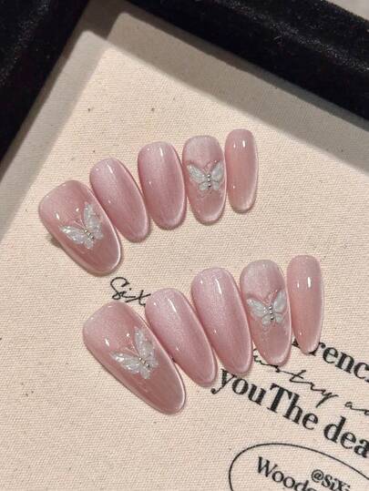 10片粉色猫眼椭圆形美甲贴片，甜美温柔，透明，3D蝴蝶装饰，完美贴合自然指甲，可重复使用，适合女性和女孩。套装包含甲油胶和指甲锉。美甲用品