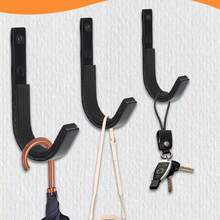 Cuatro soportes de pared de acero inoxidable, con tornillos, brocas y tapas protectoras para su instalación. Ideales para diversos lugares, como garajes, almacenes y salas de estar. - Negro - Ver 3