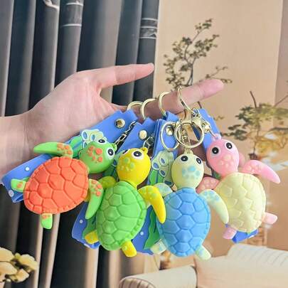 1个卡通海洋系列海龟钥匙扣吊坠，可爱PVC材质，适合挂在女士包包上，可用作派对礼物、馈赠亲友的礼物、日常配饰