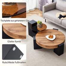 Modern, Simple Round Coffee Table With Two Levels - Transparent Brown Glass Top And Black L-Shaped MDF Legs. The Detachable Design Allows For Flexible Room Use.