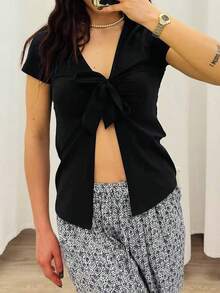 Stylish Women's Deep V Neck Knitted Short Sleeve Top With Tie Front Detail Regular Fit Slit Hem Semi-Sheer - Black - View 5