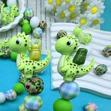 25/42/64颗3D恐龙及恐龙蛋系列硅胶珠套装 - 粉色、红色、蓝色、绿色恐龙及恐龙蛋造型设计 - 可爱动物造型珠子 - 非常适合DIY制作钥匙扣、项链、手链、装饰笔、珠宝和吊坠 - 适合作为节日和生日礼物 - 恐龍系列 - 查看 10