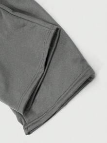 Quần nỉ nam cỡ lớn, dáng rộng, màu xám đậm, thiết kế dây rút, thoải mái và đa năng. - Màu xám đen - Xem 4