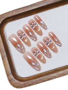10片手工椭圆形亚克力按压式美甲，中长款，柔和裸粉色，闪亮金色猫眼，舞狮图案，闪粉美甲宝石水钻镶嵌，新年礼物，前卫优雅简约新年美甲，冬季假指甲，新年节日美甲，适合派对、日常、约会、海滩、热带度假等场合，DIY假指甲艺术，适合女性和女孩作为礼物美甲用品 - 粉色 - 查看 2
