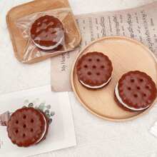 畅销逼真巧克力曲奇——“哞哞乐趣”——一款由类似硅胶材质制成的减压玩具。流动奶油夹心曲奇，可作为玩具帮助成人和学生缓解压力。 - 彩色 - 查看 11