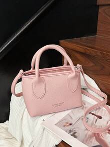 极简风格烫金字母装饰女士手提包，高端极简设计单肩包，时尚浅粉色可调节肩带斜挎包，轻便小巧的大学生随身包，拉链多功能通勤包，耐用PU材质手提包，适合送礼、购物、约会、商务旅行、度假等场合。 - 粉色 - 查看 6