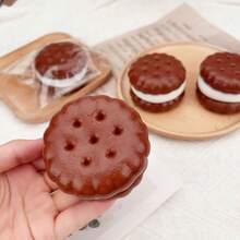 畅销逼真巧克力曲奇——“哞哞乐趣”——一款由类似硅胶材质制成的减压玩具。流动奶油夹心曲奇，可作为玩具帮助成人和学生缓解压力。 - 彩色 - 查看 12