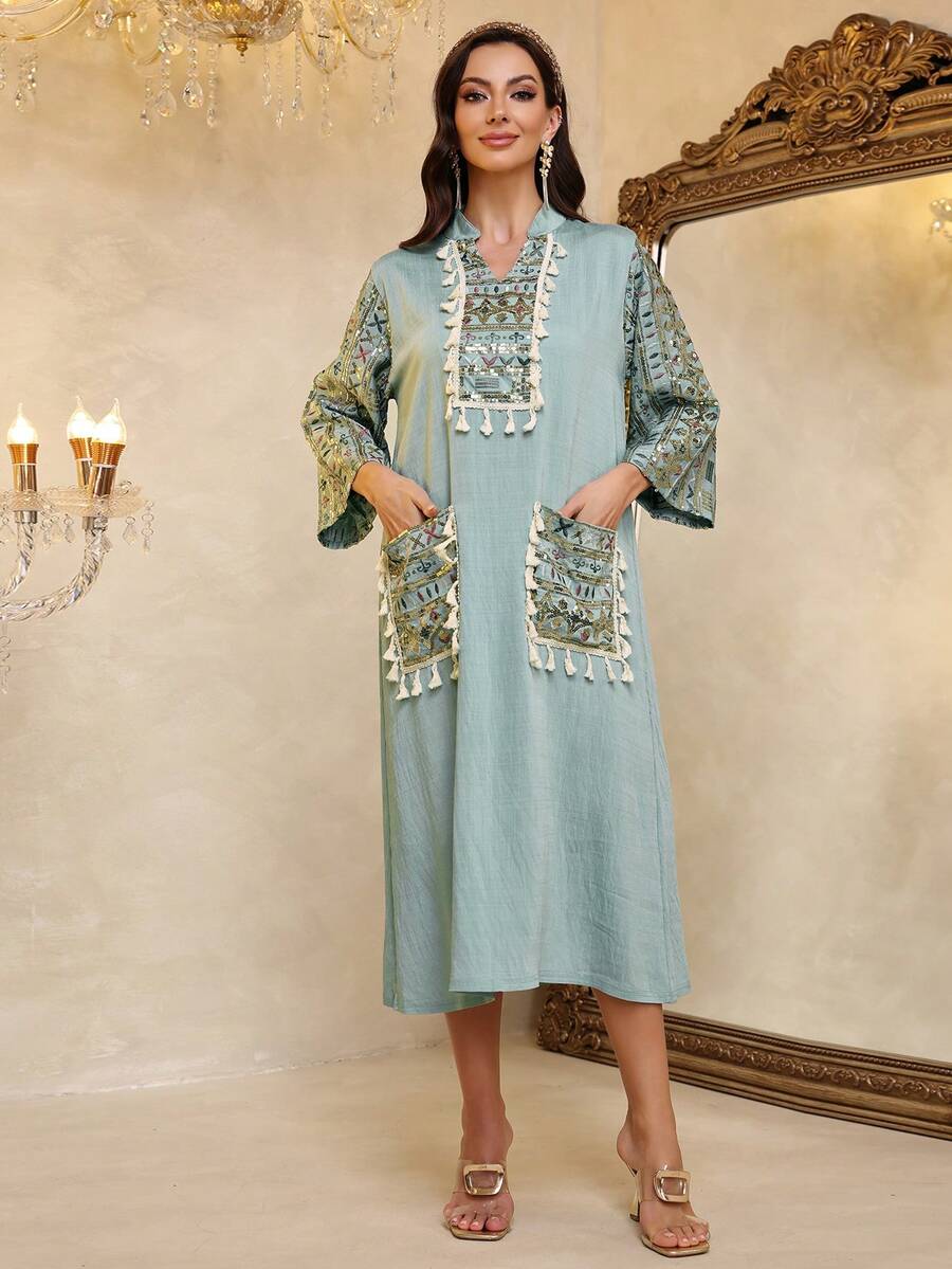 2026 New Style Ramadan Traditional Elegant Embroidered Arabic Dress With Tasseled Neckline, Contrast Stitching, Sequin Accents, Pockets, And Relaxed Flowy Long Sleeves