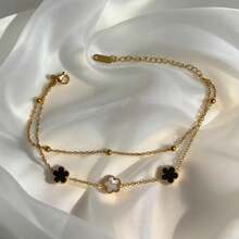 1条双层四叶草手链，黑白配色，优雅奢华，适合日常佩戴和派对场合，精美礼品