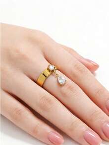 TONSI 时尚、浪漫、精致、奢华、简约的18K镀金不锈钢立方氧化锆水滴戒指，情侣戒指、结婚戒指，适合日常佩戴、通勤、派对，也是送给情侣、朋友、情人节的理想礼物。