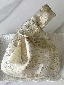 1件装多功能腕包，这款宽敞的礼品袋是一款创意单肩手提包，非常适合度假，复古风格，重点在于流苏金色提花腕包。 - 彩色 - 查看 10