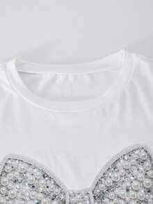 Bộ đồ 2 mảnh dễ thương cho bé gái 8-12 tuổi, áo thun cổ tròn in họa tiết màu trắng và quần ống loe đen kiểu dáng giản dị, trang phục mùa hè thanh lịch và tối giản. - trắng - Xem 9