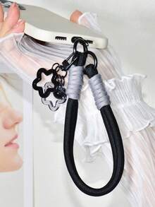 一套黑灰色尼龙编织手机壳挂绳，可拆卸腕带，镂空星形吊坠手机挂件兼钥匙扣，优雅创意包包配件，兼容安卓及大多数智能手机，送给母亲、家人、朋友、孩子、生日、节日的礼物 - 黑灰色短繩+星星掛件 - 查看 3