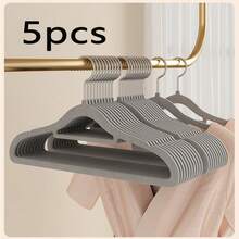 1/5/10/20/60/100个装防滑隐形衣物保护套，超薄节省空间设计，适用于衬衫、裤子、连衣裙等各种衣物，是居家衣橱、零售展示衣架的必备之选。纤薄设计，简约收纳架，坚固耐用的塑料衣架，多功能衣架，家居收纳，时尚精品店适用。