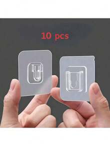 Móc dán tiện dụng, dễ lắp đặt - Móc treo tường bằng nhựa kiểu dáng đẹp, thích hợp cho bộ định tuyến, ổ cắm điện, khung ảnh, điều khiển từ xa, v.v. - Móc đa chức năng chống thấm nước, thích hợp cho nhà bếp, phòng ngủ, phòng tắm và văn phòng, có các gói 6 chiếc/10 chiếc/20 chiếc. - Trong sáng - Xem 7