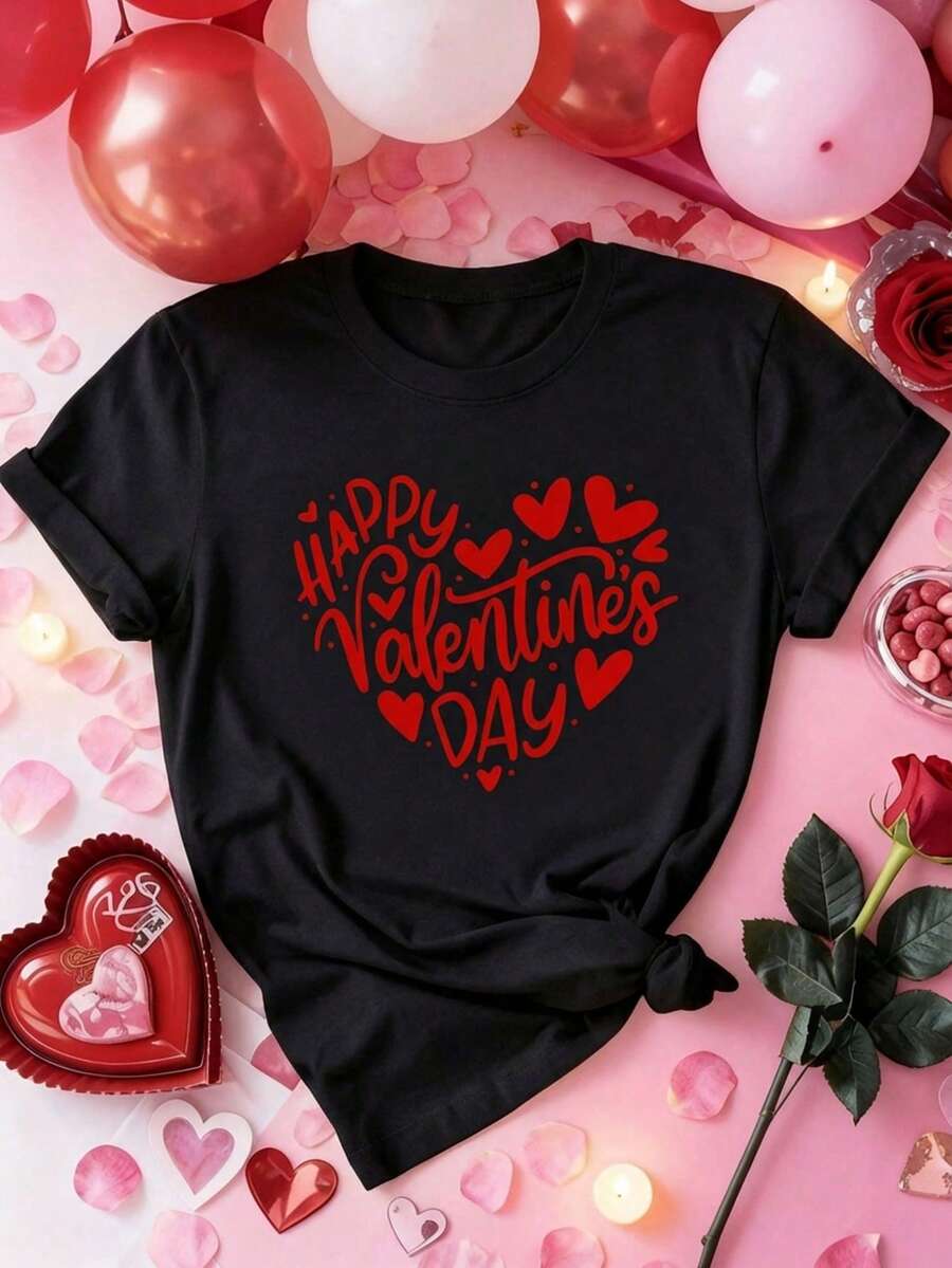 Mujer casual blusa temática con impresión "Happy Valentine's Day" de corazones, tejido suave y cómodo, diseño holgado, cuello redondo, manga corta, primavera verano, ideal para salidas, reuniones y celebraciones, blusa - Negro - Ver 1