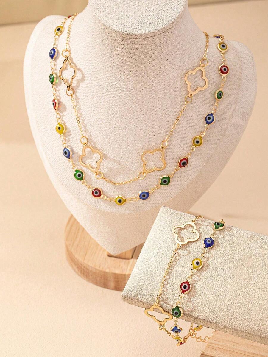 2件套时尚简约金属镂空四叶草和邪眼吊坠项链手链套装，适合少女日常、派对、节日佩戴