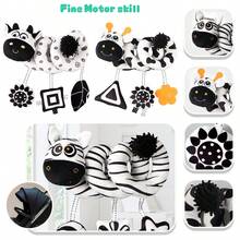 Juguete de espiral de alto contraste blanco y negro para cochecito y asiento de coche para bebés - Juguete de peluche para desarrollo sensorial y actividades en la cuna - Suave y educativo