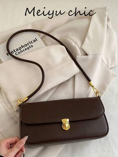 这是一款纯色PU皮革咖啡色高档百搭女士单肩包。它采用金属扣环、内部拉链、翻盖设计、方形造型、眼镜盒风格，顶部单提手可单手拎取，自由绗缝设计，以及可调节长肩带，可单肩、手提或斜挎。