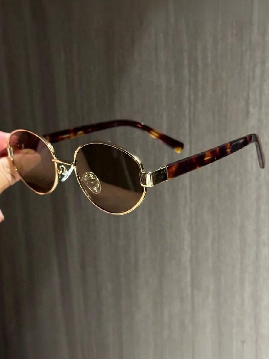 1 chiếc kính thời trang cổ điển gọng kim loại hình oval dành cho nữ, kính mắt thời trang cá tính.
