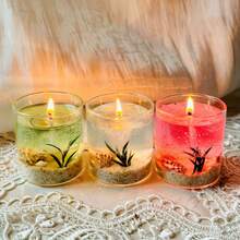 每盒1支，全新海洋生物系列果冻香氛蜡烛，随机沙滩、海藻、贝壳装饰，营造浪漫、温馨、宁静的氛围，适合作为生日礼物、派对、情人节、感恩节、周年纪念日、母亲节、父亲节、烛光晚餐、闺蜜聚会及各种浪漫场合的礼品。 - 彩色 - 查看 9