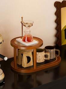 1 chiếc kệ trưng bày để bàn hình tròn kiểu retro, hai tầng, đa năng dùng để đựng nước hoa, son môi, trang sức, mỹ phẩm, cốc nhỏ, phù hợp với bàn làm việc văn phòng, quầy bar, bàn trang điểm, lối vào, nhà bếp và nhiều nơi khác. - Nhiều màu - Xem 5