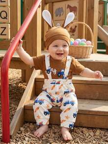 Conjunto de 3 piezas de Pascua para bebé niño, adorable mono de cuello redondo de manga corta con estampado de letras y camión, y gorro. - marrón - Ver 1
