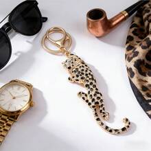 Cheetah Keychain, Gold-Toned Frame With Densely Studded Clear Sparkling Crystals, Black Crystal Leopard Print Accents, Small Green Crystal Eye Detail, 3D Dynamic Cheetah Shape, Ideal Key Accessory, Party Outfits, Gifts For Animal Lovers &  Styling - Vàng - Xem 1