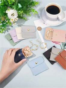 1个白色仿皮首饰袋，带搭扣，高档礼品袋，适用于耳环、项链、手链和戒指，非常适合收纳和包装。 - 彩色 - 查看 6