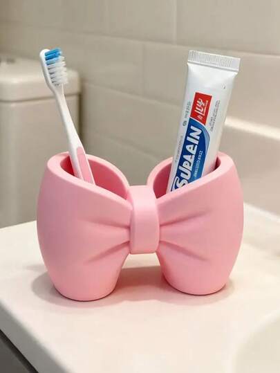 创意领结笔筒兼牙刷架，适合装饰卧室和浴室