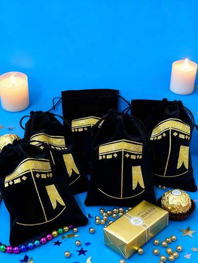 1个黑色礼品袋，饰有金色灯笼图案 - 适用于朝圣、灯笼、星星和伊斯兰节日。设计有拉环、灯笼形状、精美图案和耐用绳索。
