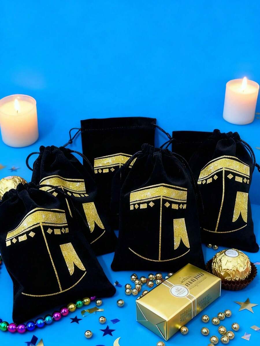 1个黑色礼品袋，饰有金色灯笼图案 - 适用于朝圣、灯笼、星星和伊斯兰节日。设计有拉环、灯笼形状、精美图案和耐用绳索。 - 黑色 - 查看 1