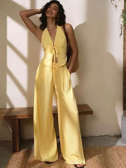 Bộ đồ nữ Yuyi màu trơn, kiểu dáng yếm hở lưng buộc dây phía trước và quần dài, thích hợp cho kỳ nghỉ, đi biển và mặc thường ngày mùa hè.