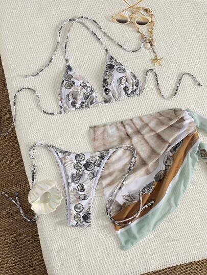 Bộ bikini 3 mảnh dành cho nữ - Họa tiết thế giới đại dương với điểm nhấn vỏ sò, áo bikini tam giác, quần bikini buộc dây bên hông và váy che tam giác voan mỏng, trang phục đi biển mùa hè tươi mát.