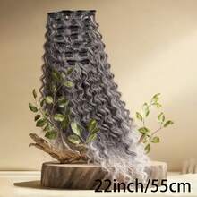 长发烫卷，并挑染了彩色发丝。用发夹固定发束，增加发量并拉长头发。适合女性在各种场合佩戴。