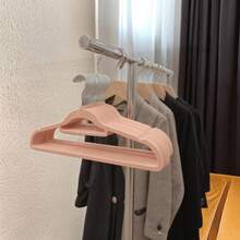 1/5/10/20/60/100个装防滑隐形衣物保护套，超薄节省空间设计，适用于衬衫、裤子、连衣裙等各种衣物，是居家衣橱、零售展示衣架的必备之选。纤薄设计，简约收纳架，坚固耐用的塑料衣架，多功能衣架，家居收纳，时尚精品店适用。