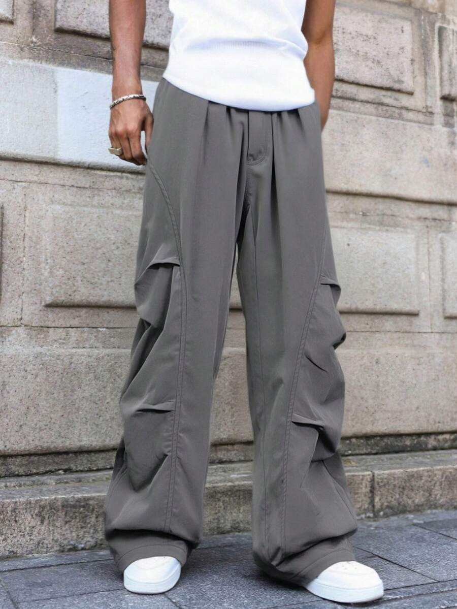 男士褶裥常规腰阔腿工装裤，宽松版型街头风长裤，侧边口袋设计，适合日常休闲穿着和度假。 - 深灰色 - 查看 1