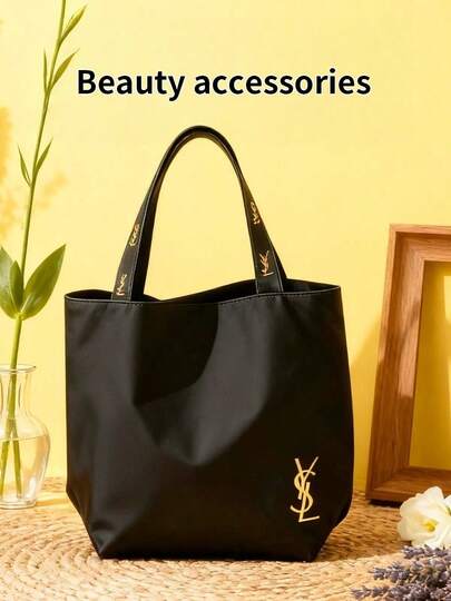 Yves Saint Laurent 1 st YSL svart axelväska i canvas, extremt minimalistisk och exklusiv stil, stor kapacitet, lämplig för arbete, shopping, skola och resor