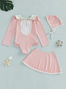 Traje de baño de 3 piezas para niña pequeña: mono de manga larga con cuello Peter Pan y bajo con volantes, protección contra erupciones cutáneas, falda a juego con cintura elástica y ribete blanco, y gorro con cierre de lazo. Ideal para vacaciones de verano en la playa o la piscina. Perfecto para niñas de 1 a 6 años. - Rosa - Ver 2
