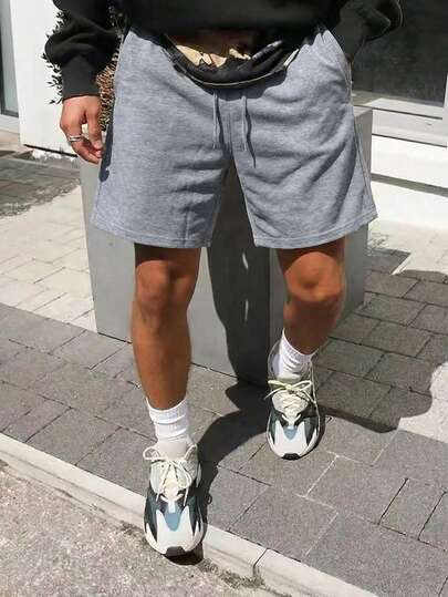 Pantalones cortos deportivos básicos de unicolor de 5 pulgadas para hombres, pantalones de entrenamiento con cintura elástica adecuados para ejercicio al aire libre