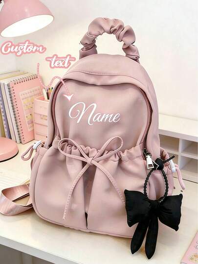 Mochila personalizada con nombre, mochila ligera de gran capacidad, mochila funcional con decoración de lazo, mochila multiusos para estudiantes, mochila casual de viaje con colgante de lazo, gran capacidad, correas ajustables, para graduados, estudiantes de primer año, perfecta para exteriores, vuelta al colegio, bolsa para la escuela